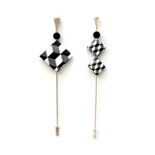 Broche Dado